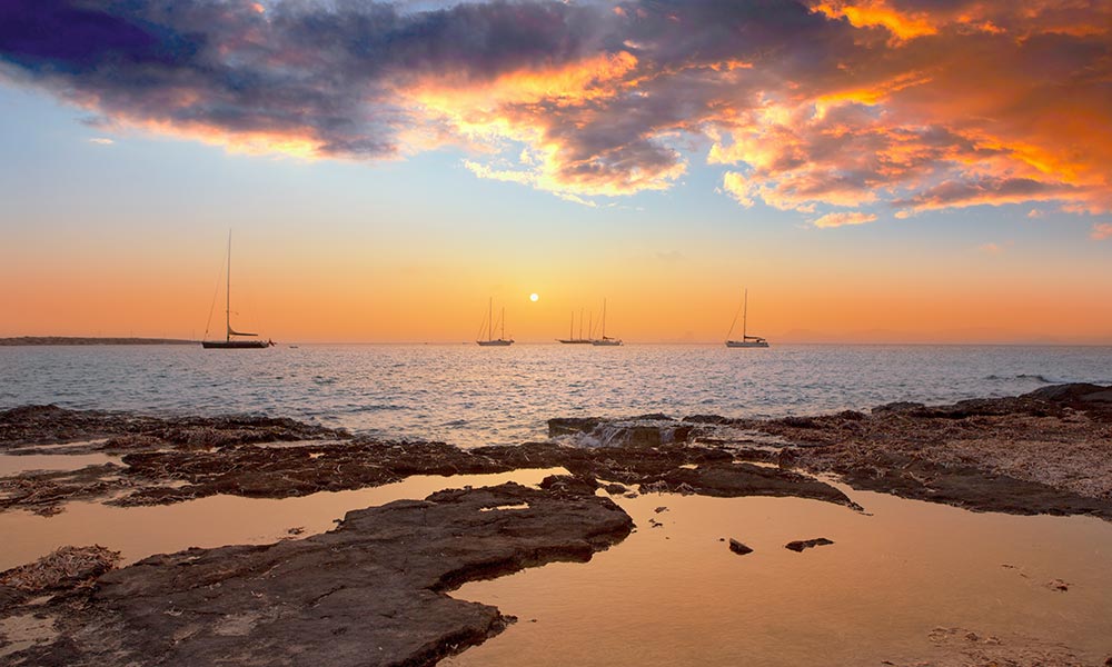 Formentera boats at sunset